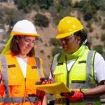 workers wearing hi viz reflective vests